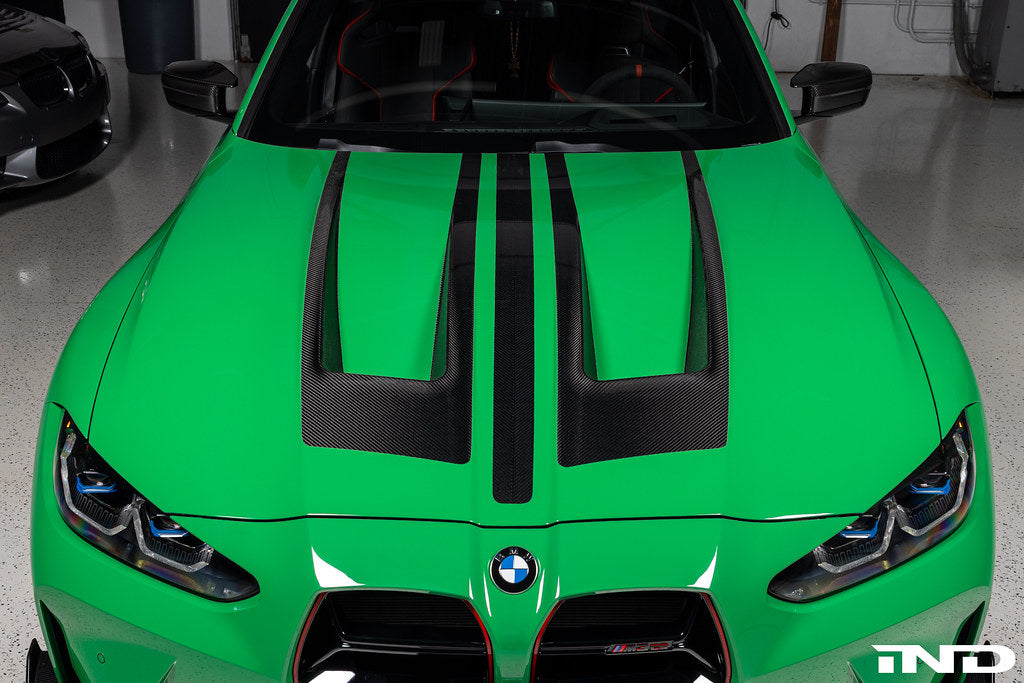 Alpha N G8X M3 M4 carbon vented hood showing sleek, lightweight exterior design with vents for improved airflow.