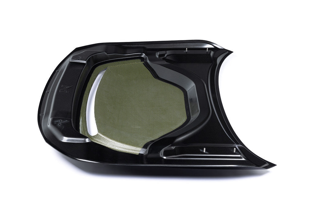 Alpha-N G87 M2 carbon vented hood installed on a vehicle with a white background, showcasing its lightweight, aerodynamic design.