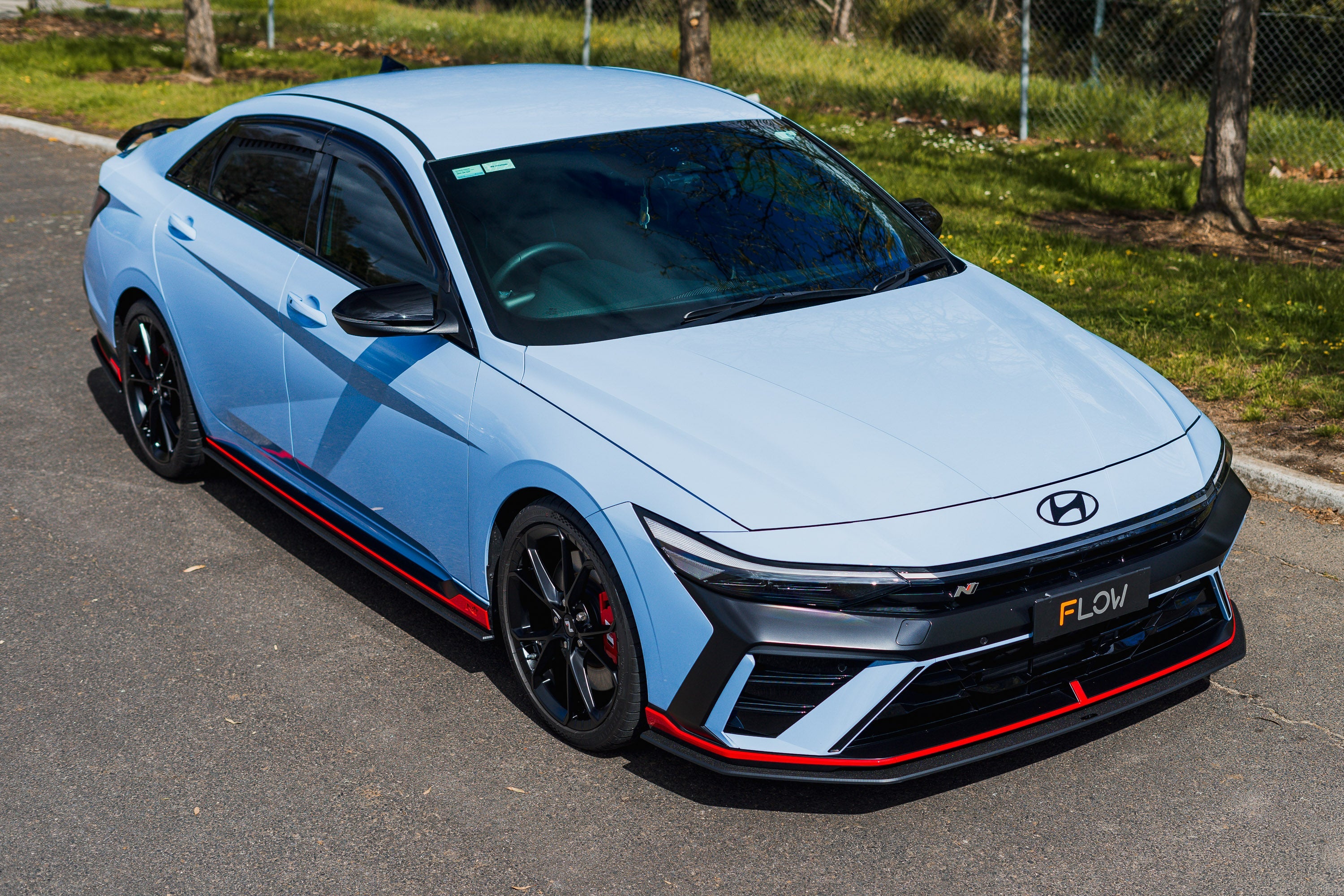 Flow Designs EX-DISPLAY - CN7 V2 i30N Sedan FL 2024 Side Skirt Splitters (Pair) - GLOSS BLACK - iilumolab