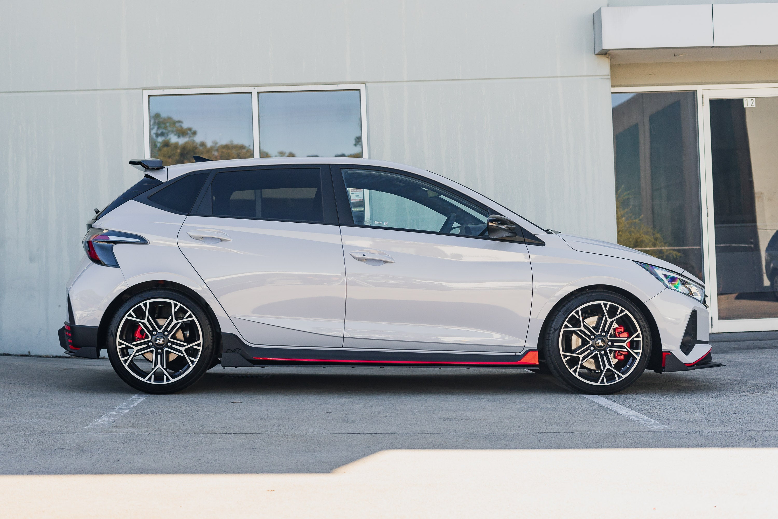 Flow Designs EX-DISPLAY - i20 N BC3 Pre-Facelift / Facelift - Side Skirt Splitters (Pair) - GLOSS BLACK - iilumolab