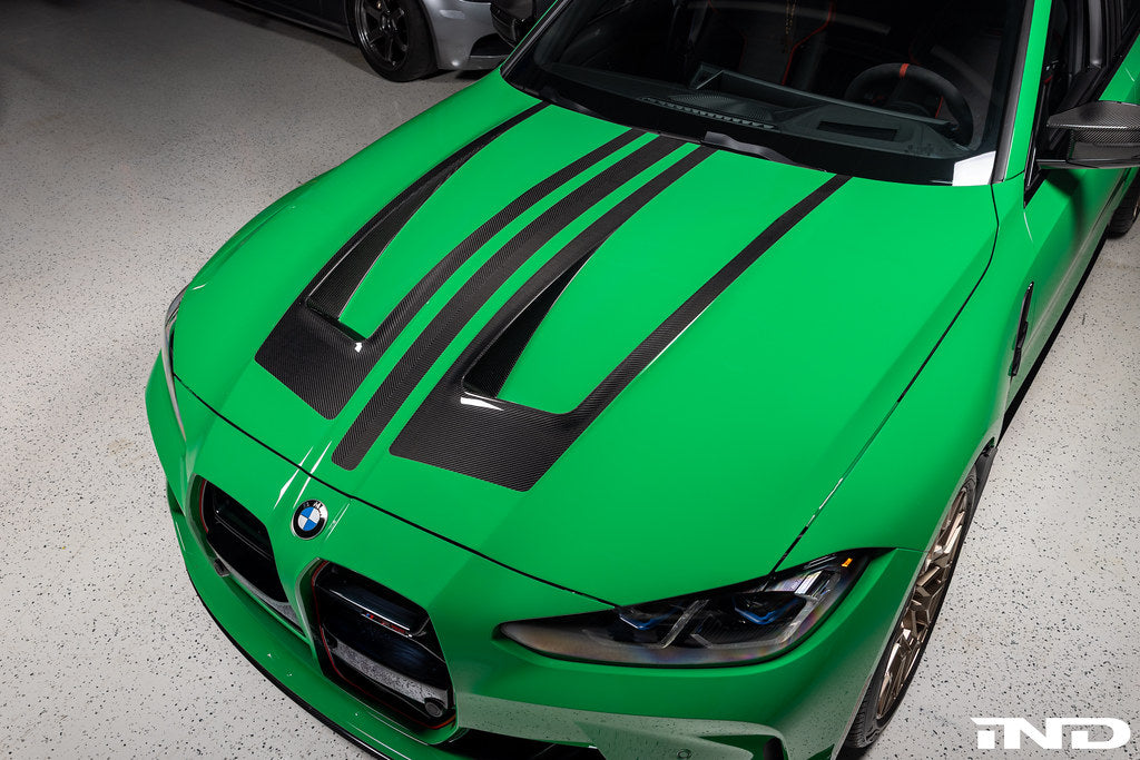 Alpha N Alpha-N G8X M3 M4 carbon vented hood exterior view showing lightweight, aerodynamic design with vent openings.