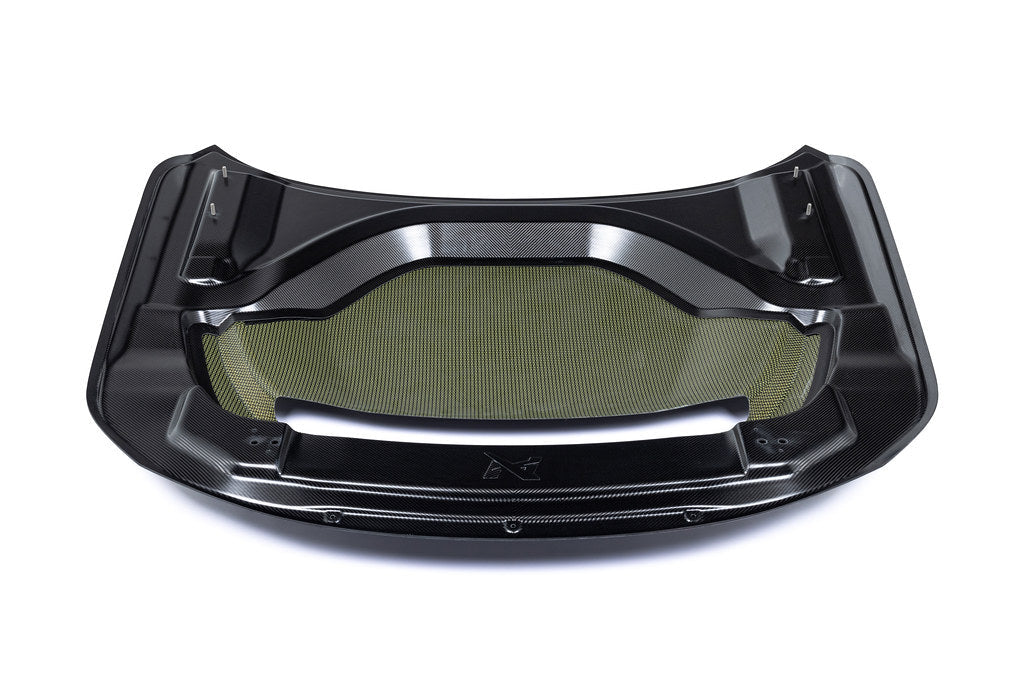 Alpha-N G87 M2 Carbon vented hood installed on a vehicle, showcasing lightweight, aerodynamic exterior design against a white background.