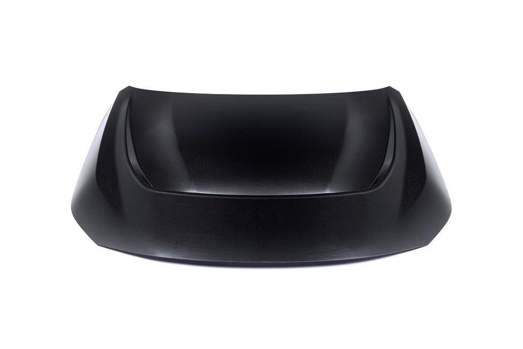 Alpha N G87 M2 carbon vented hood shown on white background, showcasing lightweight, aerodynamic exterior car hood design.