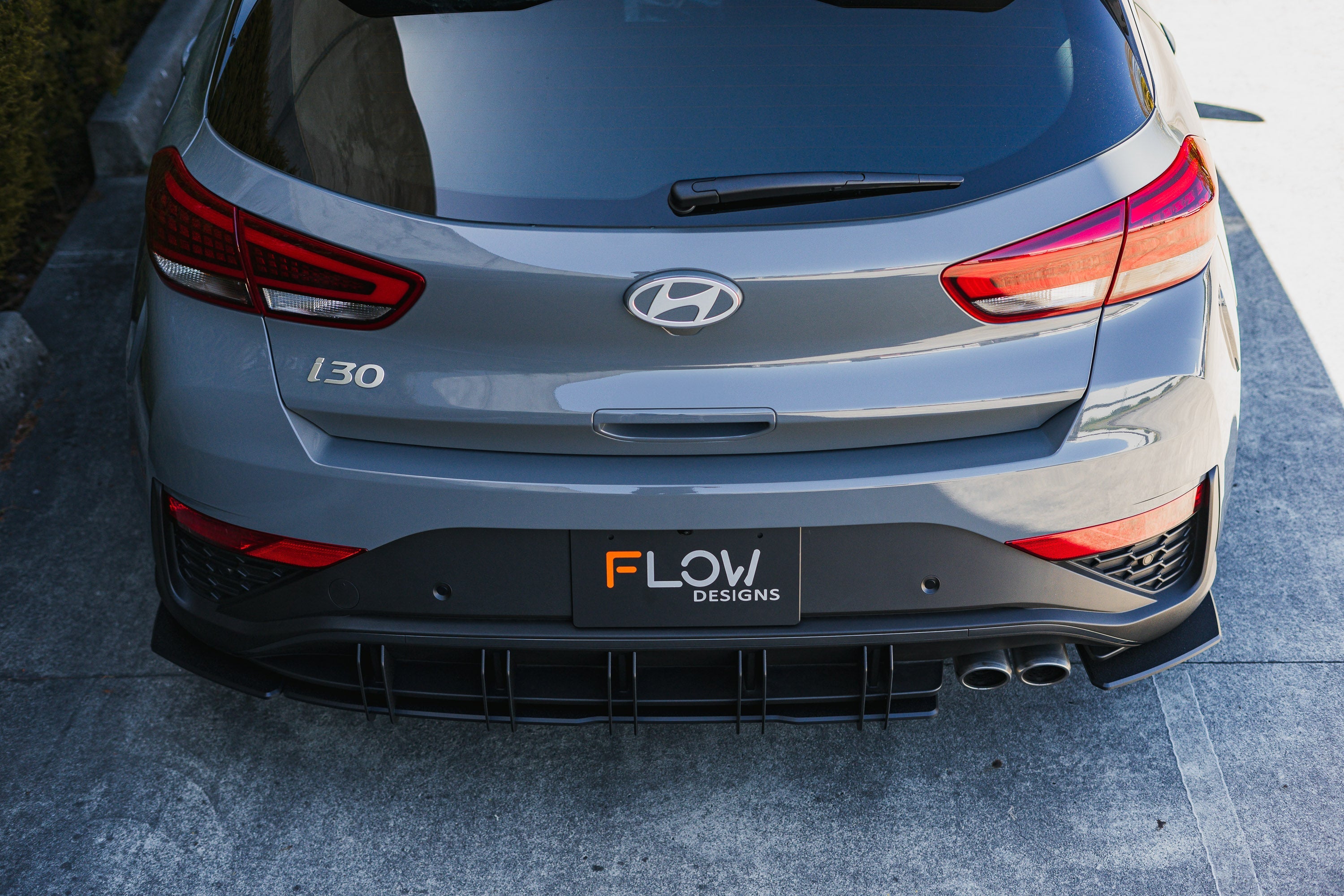 Flow Designs DEMO STOCK - i30N-Line Hatch PDe.V6 FL 2024+ Rear Spats (Pair) - GLOSS BLACK - iilumolab