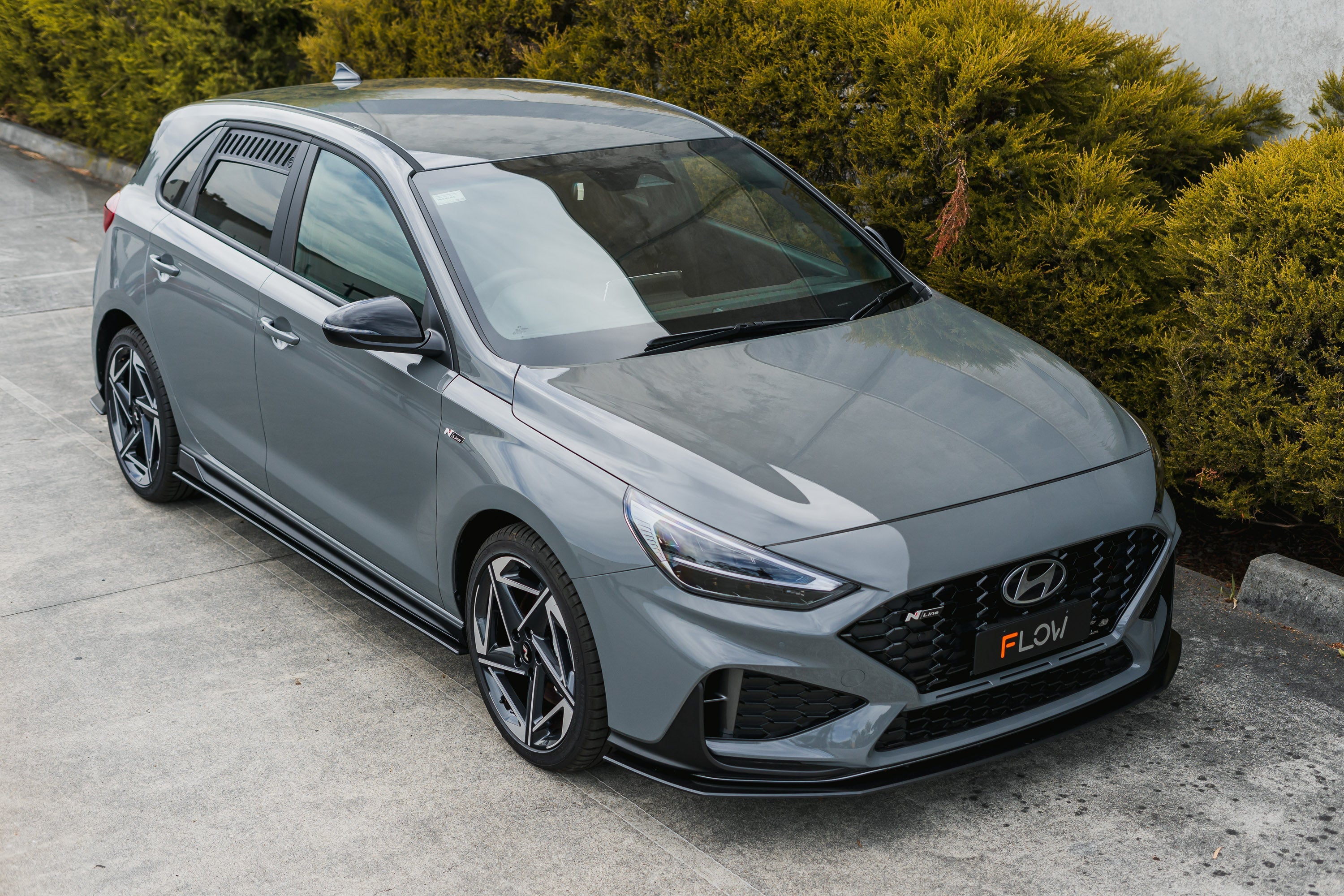 Flow Designs i30N-Line Hatch PDe.V6 FLÂ 2024+ Front Lip Splitter Extensions (Pair) - iilumolab