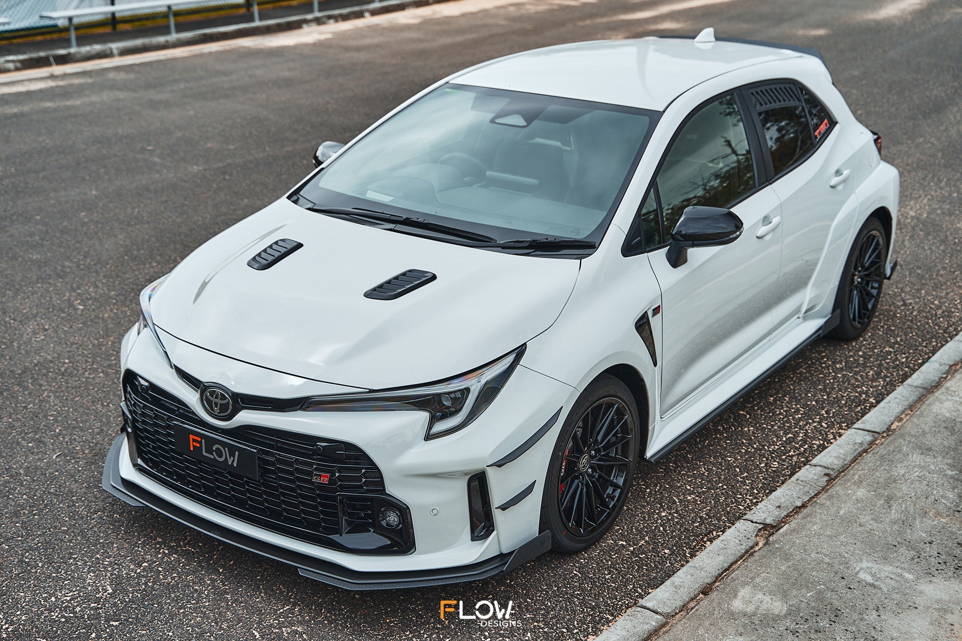 Flow Designs Corolla GR Chassis Mounted Front Lip Splitter (GLOSS) - iilumolab