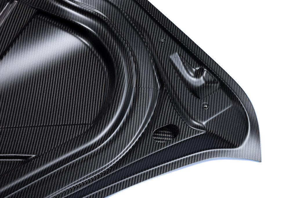 Alpha N G87 M2 Carbon CSL trunk lid for BMW, exterior view showing lightweight carbon fiber material on white background.